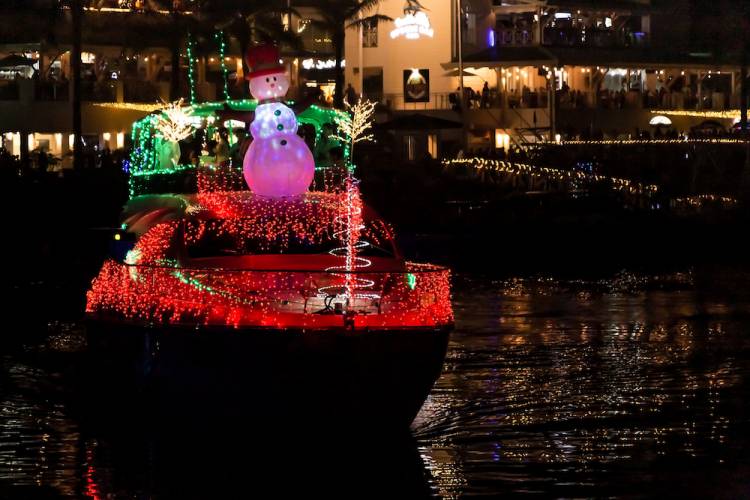 boat with christmas decorations and lights 